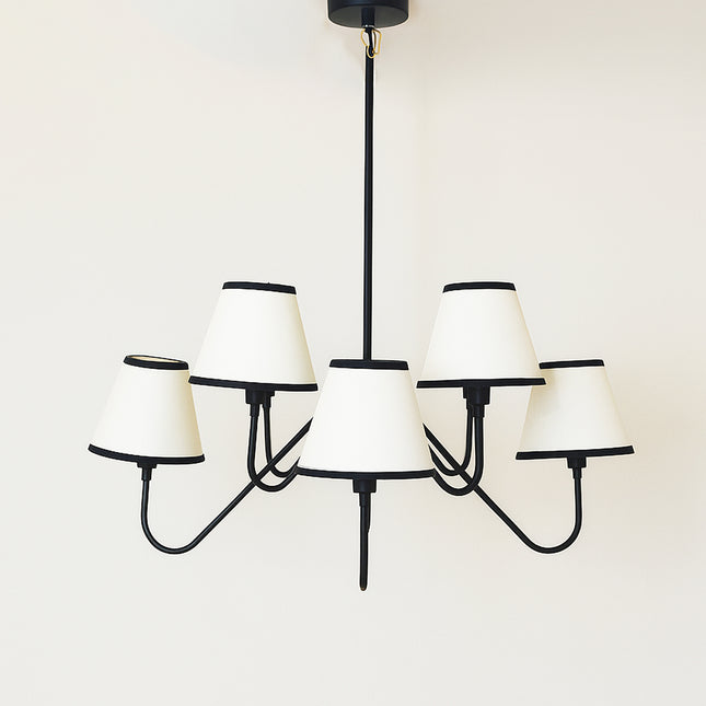 The Matte Black Chandelier Light redefines sophistication with bold contemporary charm. matte black