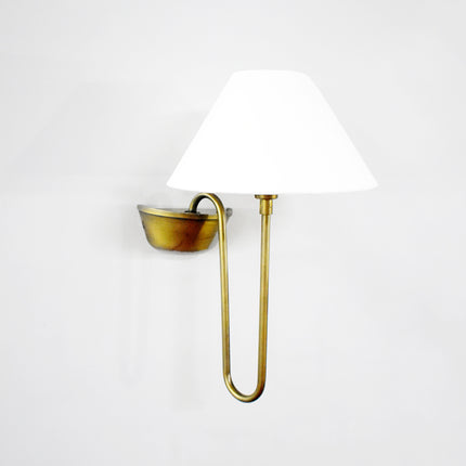 Modern grace wrapped in the heritage of the Brown Antique wall sconce