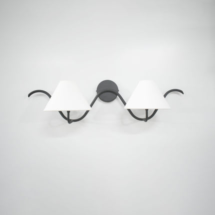 The Matte Black sconce Luxe Touch Your Wall Deserves
