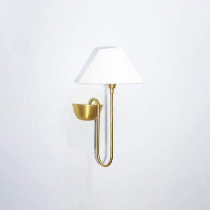 Modern geometry meets vintage appeal in Gold Brass form.