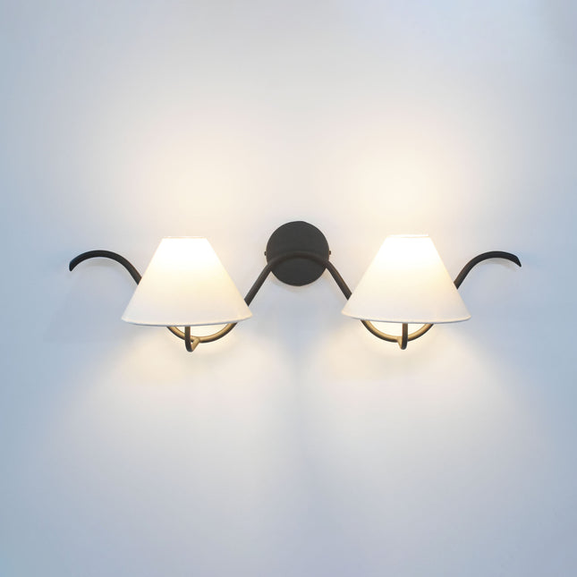 The Matte Black sconce Luxe Touch Your Wall Deserves