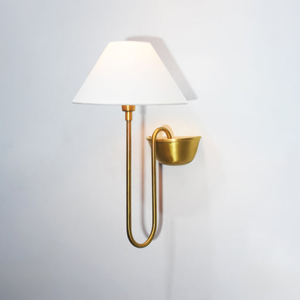 Modern geometry meets vintage appeal in Gold Brass form.