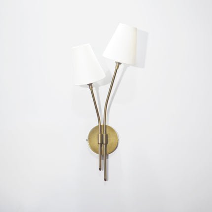 Illuminate your home with the regal charm of the Brown Antique wall sconce.