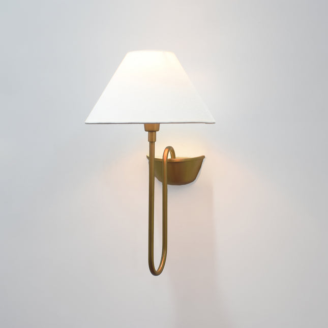 Modern grace wrapped in the heritage of the Brown Antique wall sconce