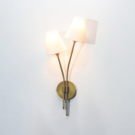 Illuminate your home with the regal charm of the Brown Antique wall sconce.
