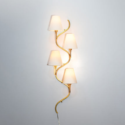 The Gold Brass wall sconce — where sophistication meets light.